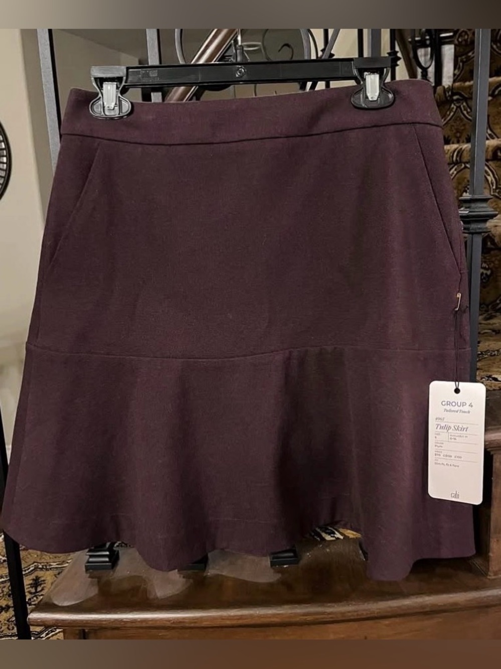 cabi #4965 Tulip Skirt. NWT. Size 6. Retails - $119. Color - plumb.